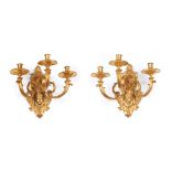 A pair of Louis XIV style three branch wall sconces