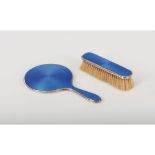 A hand held mirror and brush, Silver 925/000, Guilloche decoration of applied blue enamel element,