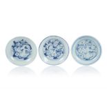 A set of three small plates, Chinese porcelain, Blue underglaze decoration of landscape with central