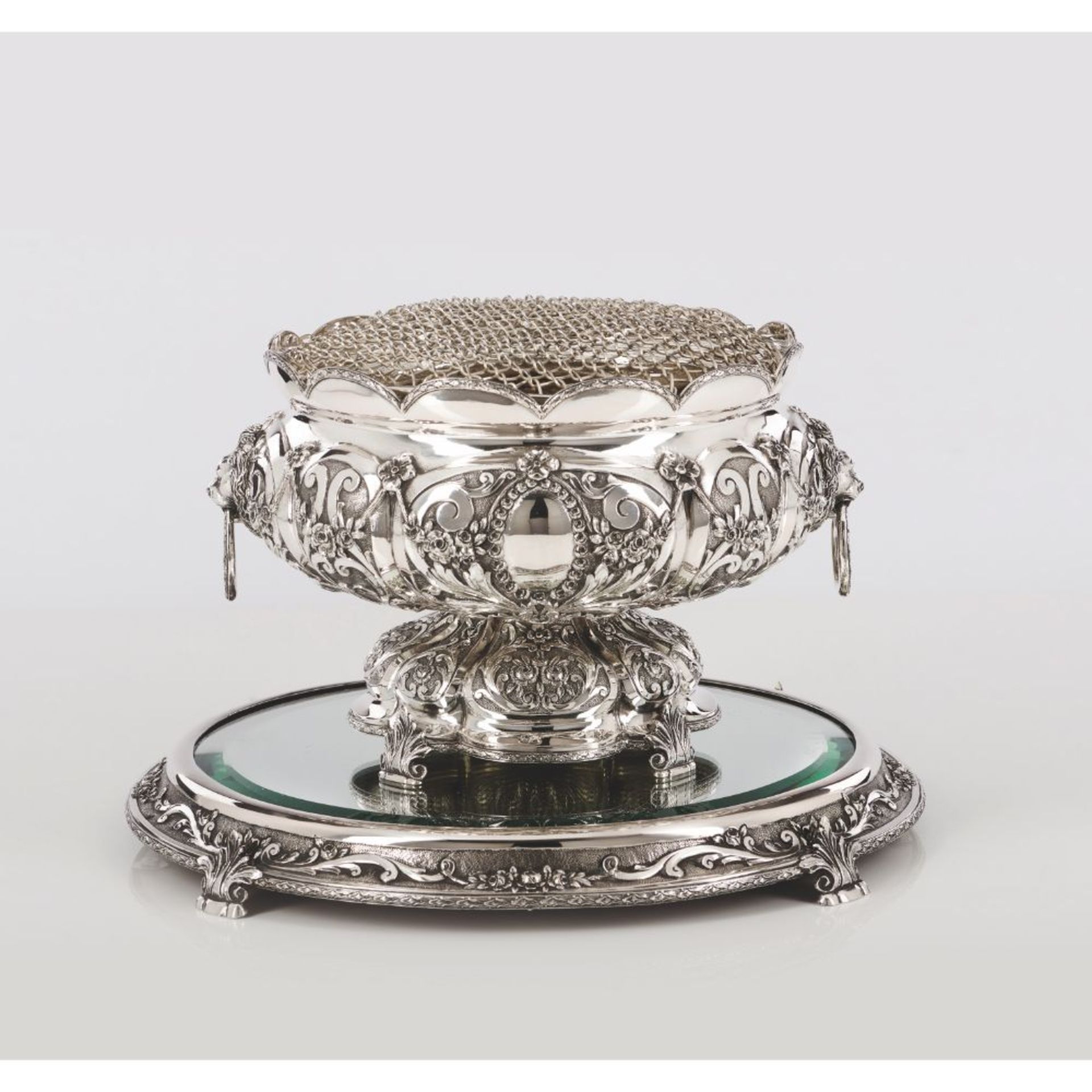 A centrepiece / flower holder, Silver 833/000, Gadrooned and reliefs decoration with lion heads