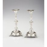 A pair of Romantic era candlesticks, Silver 833/000, Reliefs, pierced and monogram engraved