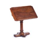 A Victorian reading table, Mahogany and burr mahogany, Central shaft with adjustable height and