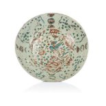 A deep saucer, Chinese export porcelain, Polychrome "Famille Verte" enamelled decoration of floral