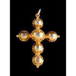 A CROSS SHAPED PENDANT