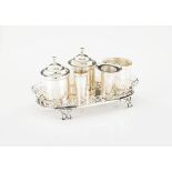 A neoclassical galleried writing set, Silver, Comprising of inkwell, sand pot, container and two