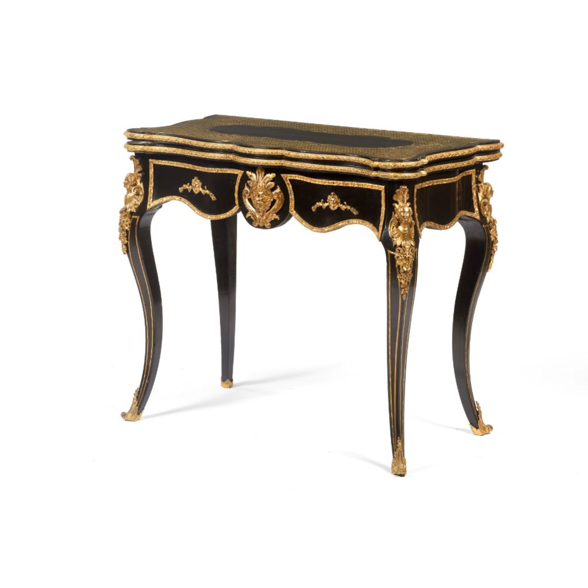 A Napoleon III card table, Ebonised wood, Yellow metal marquetry decoration, Gilt and chiselled