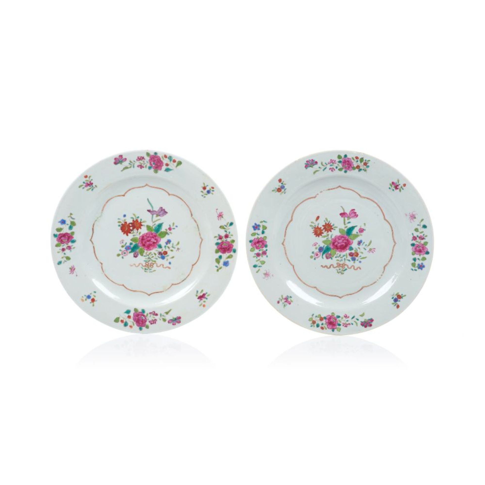 A pair of plates, Chinese export porcelain, Polychrome floral "Famille Rose" enamelled decoration,