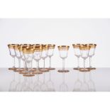 A set of fourteen "Saint Louis" wine drinking glasses, Crystal of gilt decoration, Marked to
