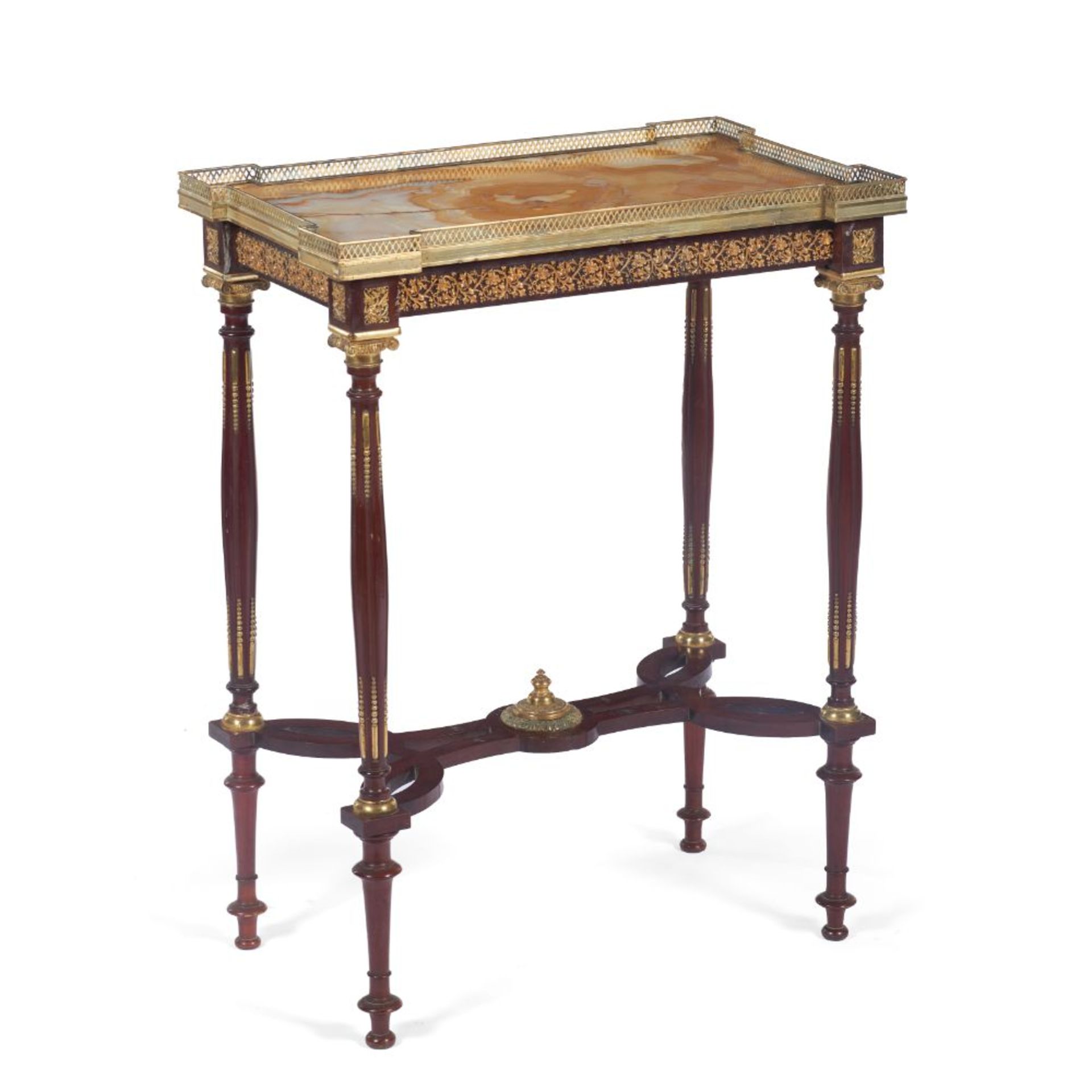 A Napoleon III gueridon, Mahogany, Ribbed legs, marble top of gilt metal gallery and applied