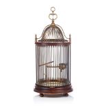 A suspending cage, Walnut and gilt metal, glass lined drinking container, France, 19th century, (
