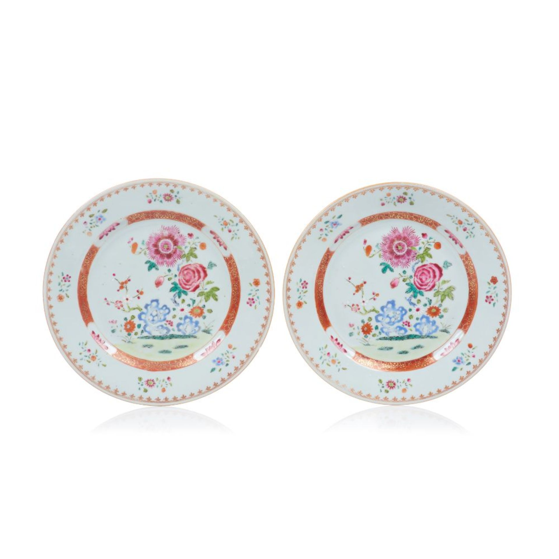 A pair of plates, Chinese export porcelain, Polychrome Famille Rose enamelled and iron oxide