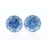 A pair of saucers, Chinese export porcelain, Blue underglaze decoration of floral motifs and