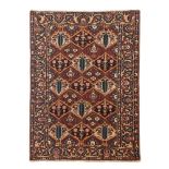 A Bakhtiari rug, Iran, Wool and cotton of geometric pattern in beige, salmon and blue shades, 210-