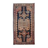 A Malayer rug, Iran, Wool and cotton of geometric pattern in salmon, green and blue shades,