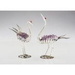 Long-legged birds, Two silver 800/000 sculptures, Engraved and repoussé decoration, Two applied