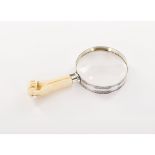 A LUIZ FERREIRA magnifying glass, Hand shaped carved ivory handle, Applied silver 835/000