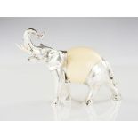 A MANUEL ALCINO elephant, Silver 925/000 sculpture, Chiselled decoration, Ostrich egg body and ivory