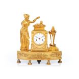 An Empire tabletop clock, Gilt bronze, Enamelled dial of Roman numbering hour markers, Depicting a