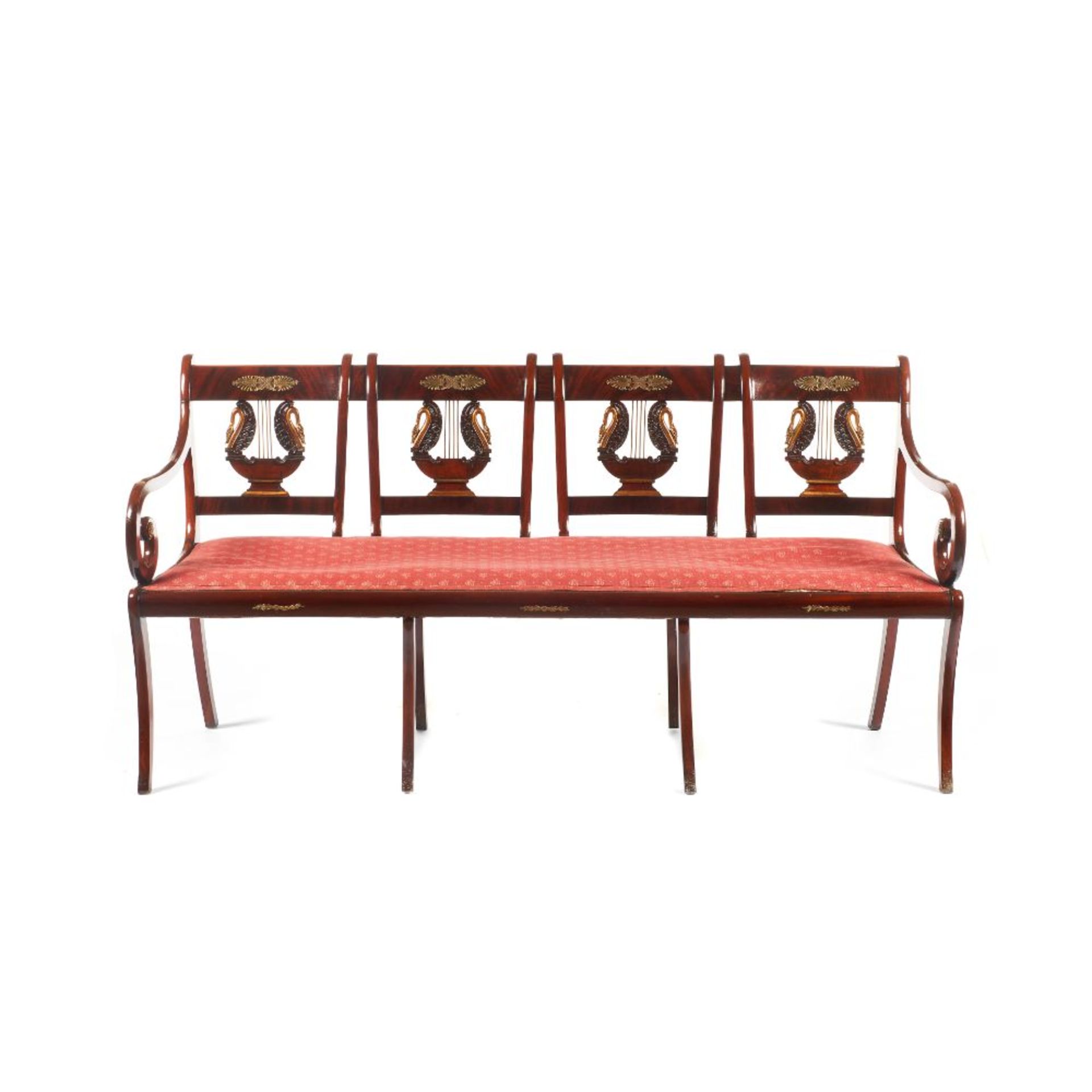 A Four seater settee, Mahogany, Swans carved, pierced and part gilt decoration to backs, Bordeaux