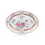 A scalloped oval serving platter, Chinese export porcelain, Polychrome floral "Famille Rose"