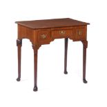 A George II lowboy / side table, Mahogany, Three drawers, yellow metal hardware and bun feet,