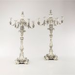 A pair of four branch candelabra