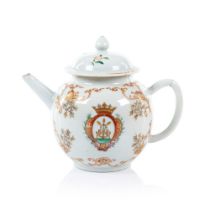 An armorial teapot and cover