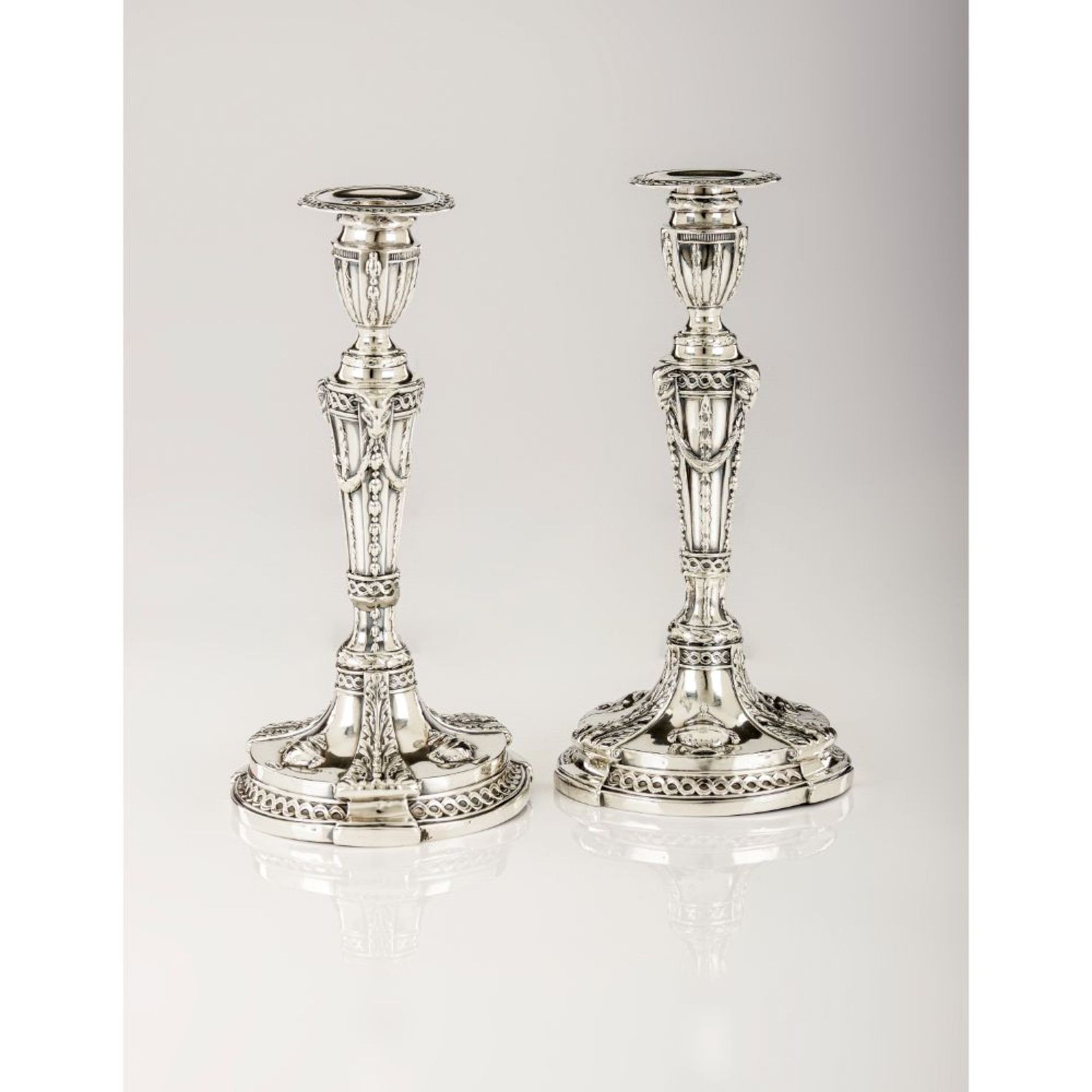 A pair of candlestands