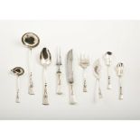 A set of nine serving utensils