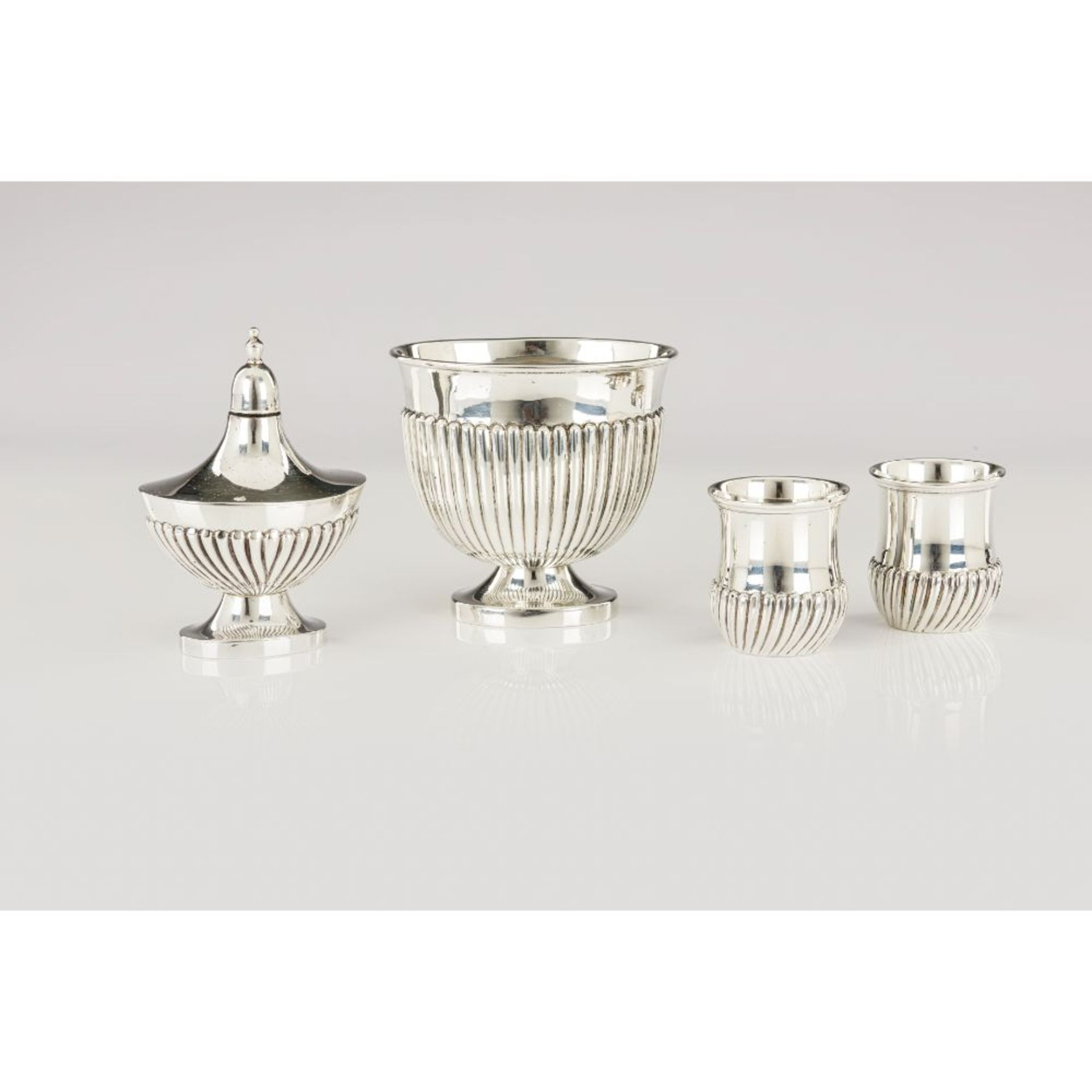 A group of bowl, burner and pair of beakers