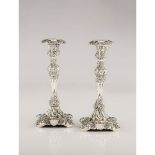 A pair of Romantic Period candlesticks