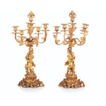 A pair of six branch candelabra