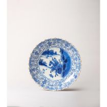 A blue and white 'Hare Hunt' and 'Bajixiang' deep dish 康熙时期青花猎兔及八吉祥深盘