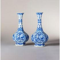 A pair of Chinese blue and white faceted hexagonal bottle vases 康熙时期中国青花六角形刻面瓶一对