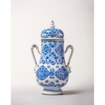 A blue and white double-handled pear-shaped jar with cover 康熙时期青花双把梨形罐及盖