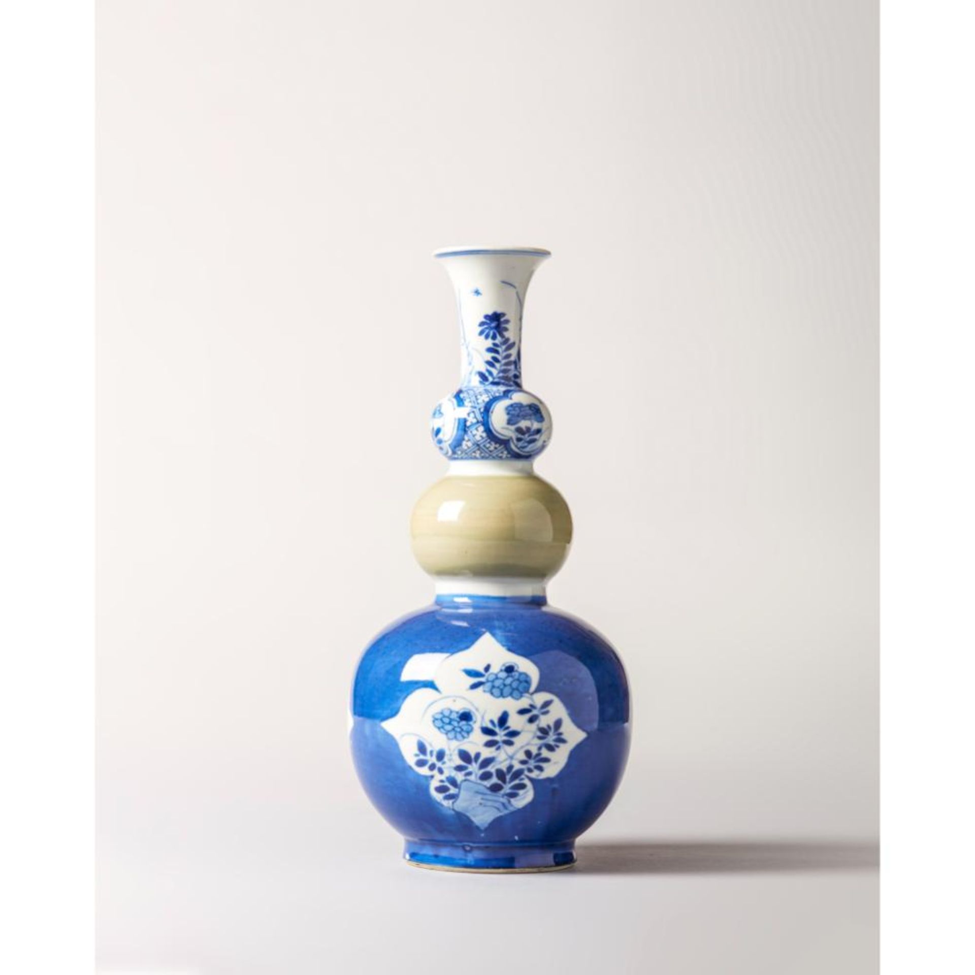 A blue and white and celadon triple-gourd vase 清代青花及青瓷三联瓶
