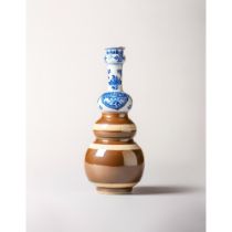 A blue and white and 'Batavian-brown' triple-gourd vase 清代青花及巴达维亚棕色三联瓶