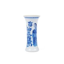 A blue and white miniature beaker vase
