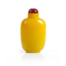 A yellow glass snuff bottle