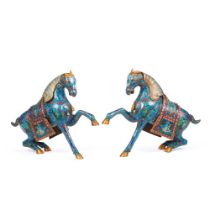 A pair of cloisonne enamel figures of horses