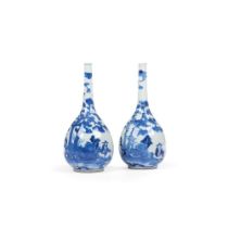 A pair of blue and white bottle vases