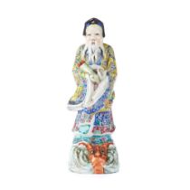 A Famille Rose figure of Zhang Guolao