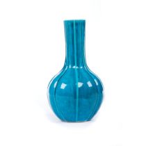 A turquoise-glazed bottle vase