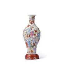A moulded Famille Rose wall vase