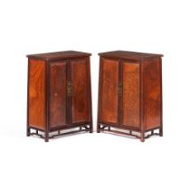 A rare pair of harwood small tapered two-door side cabinets, gui