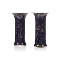 A pair of beaker vases