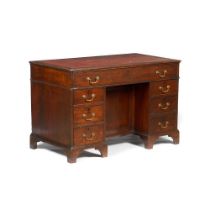 A Victorian kneehole desk