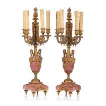 A pair of five branch candelabra