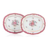 A pair of scalloped oval serving platters