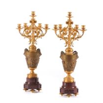 A pair of six branch Louis XV style candelabra